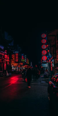 Vibrant Nightlife in Shanghai: Illuminated Streets and Neon Signs