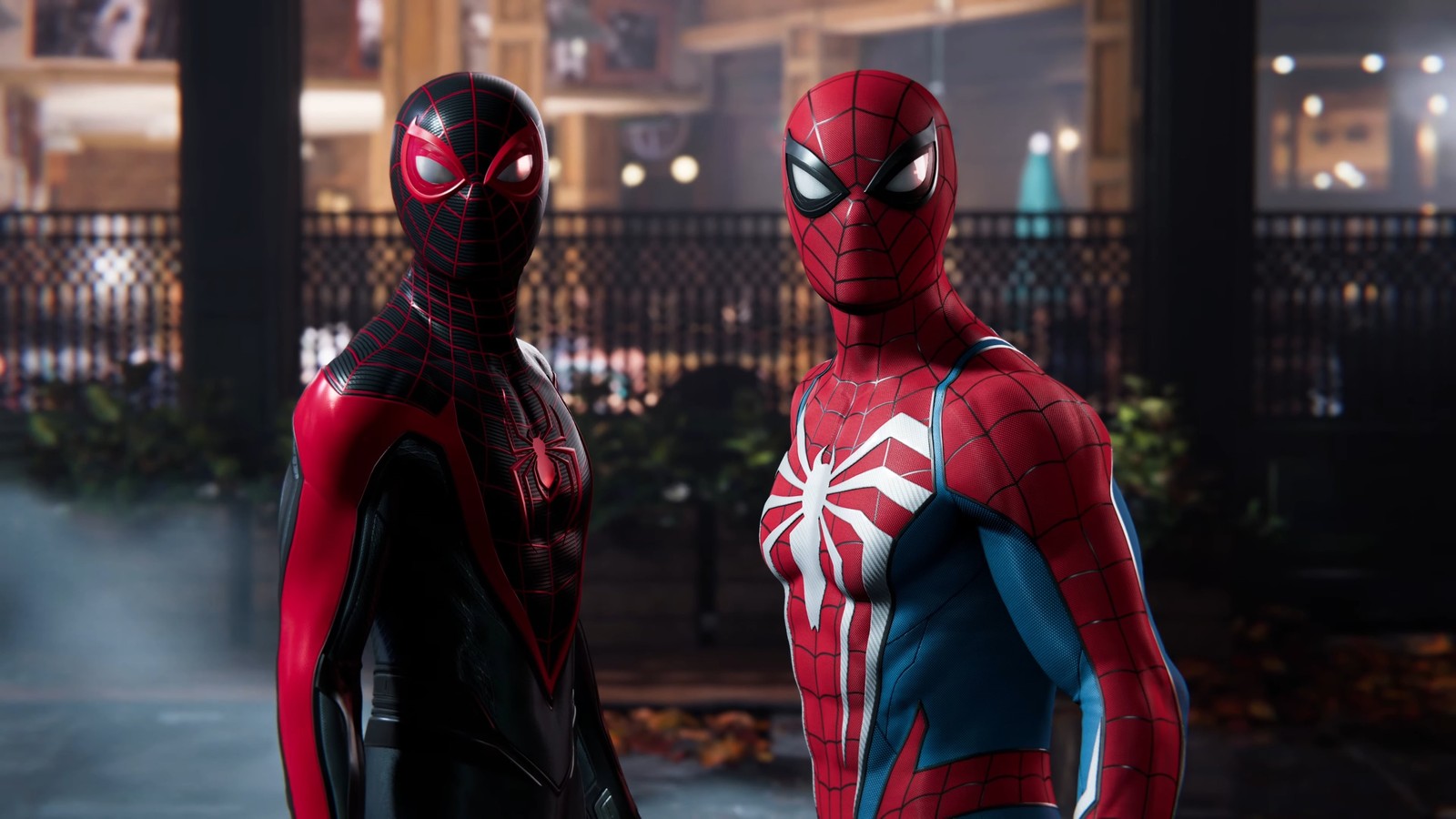 Spider-man et spider-woman se tiennent devant un bâtiment (marvel spider man 2, marvels spider man 2, jeux 2023, playstation 5, super héros marvel)