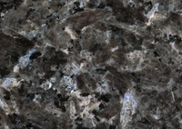 Polished granite surface showcasing intricate mineral patterns and textures.