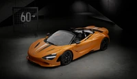 McLaren 750S юбилейное издание в ярком оранжевом цвете, демонстрирующее элегантный дизайн и производительность.