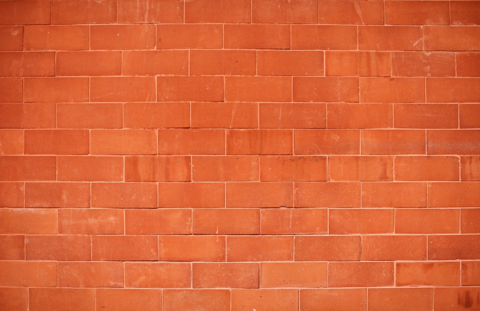 A close up of a fire hydrant in front of a brick wall (color, newyear, newyou, zabstract, znewyear19)