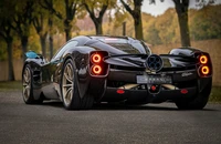 Pagani Utopia: Striking Rear View Showcasing Carbon Fiber Design and Sleek Aesthetics