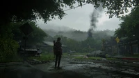 Ellie dans un paysage urbain désolé et envahi par la végétation de The Last of Us Part II.