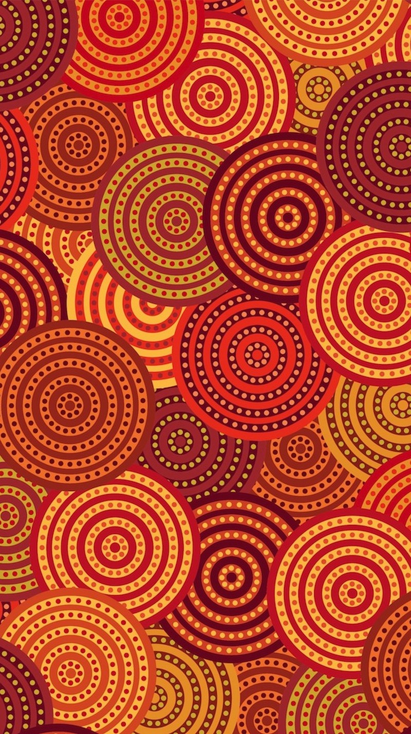 A close up of a pattern of circles on a red background (abstract, circle)