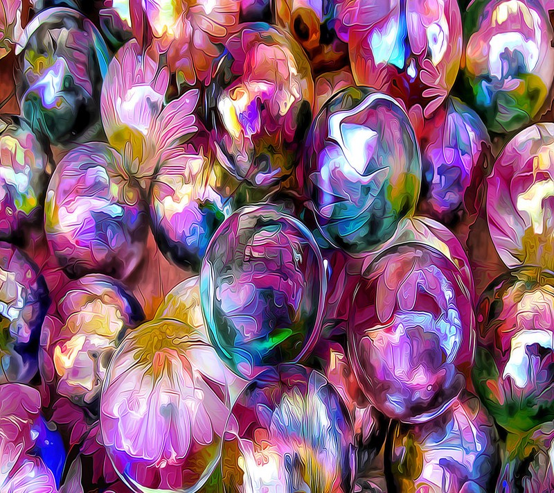 A close up of a bunch of colorful glass ornaments (floral, flowers)