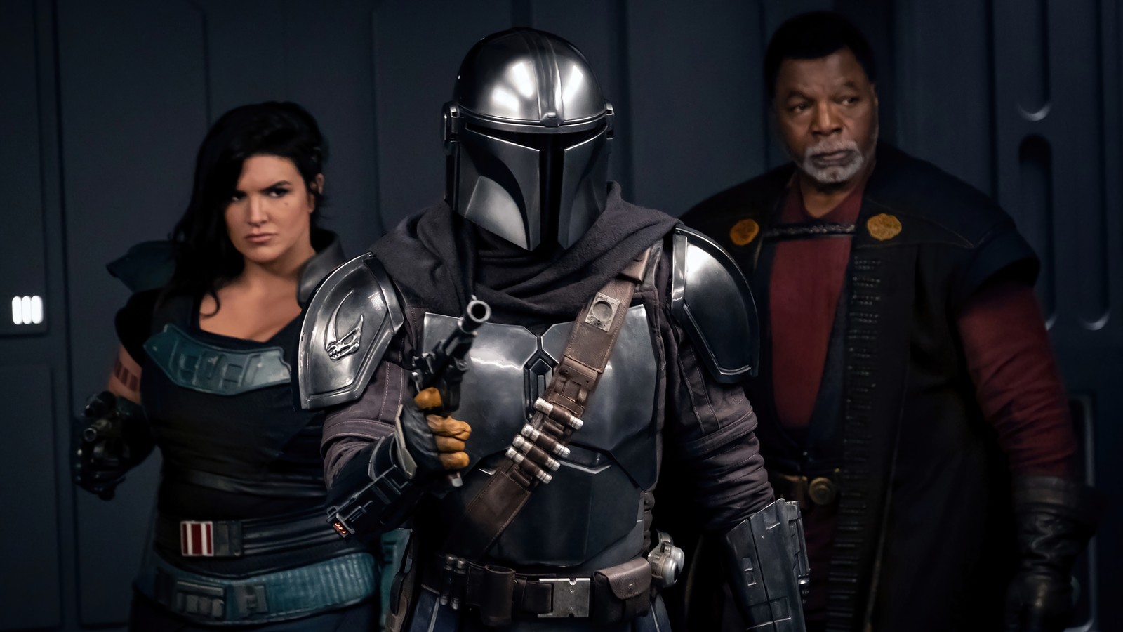 A close up of a person in a helmet and a woman in a dress (the mandalorian, season 2, star wars, tv series, characters)