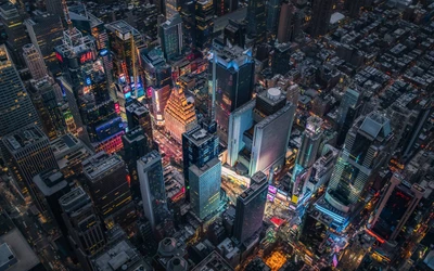 Céu noturno vibrante de Times Square: uma vista de pássaro da metrópole