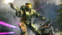 Master Chief in action, battling enemies in a vibrant, dynamic scene from Halo Infinite.