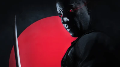 Vin Diesel in a dark, intense pose with bloodshot eyes and a sword, set against a striking red backdrop.