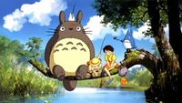 Totoro e amigos desfrutando de um dia tranquilo à beira da água