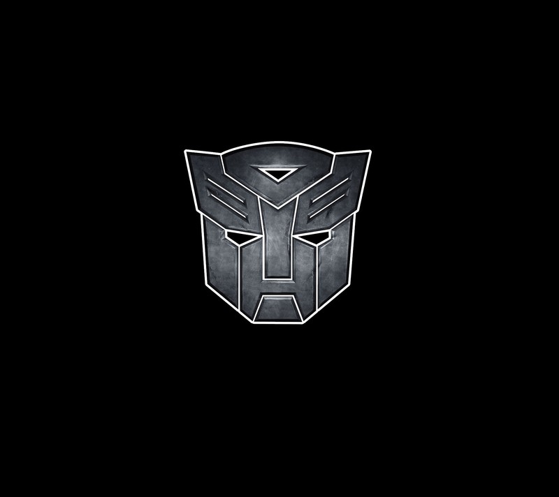 Близкий план черно-белого логотипа на черном фоне (auto bots, трансформеры, transformers)