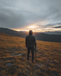 Contemplating the Sunset Over Highland Tundra