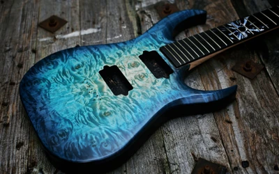 Stunning Blue Electric Guitar with Unique Grain Pattern on Rustic Background