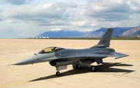 Mitsubishi F-2 Multirole Combat Aircraft on Tarmac with Mountain Backdrop