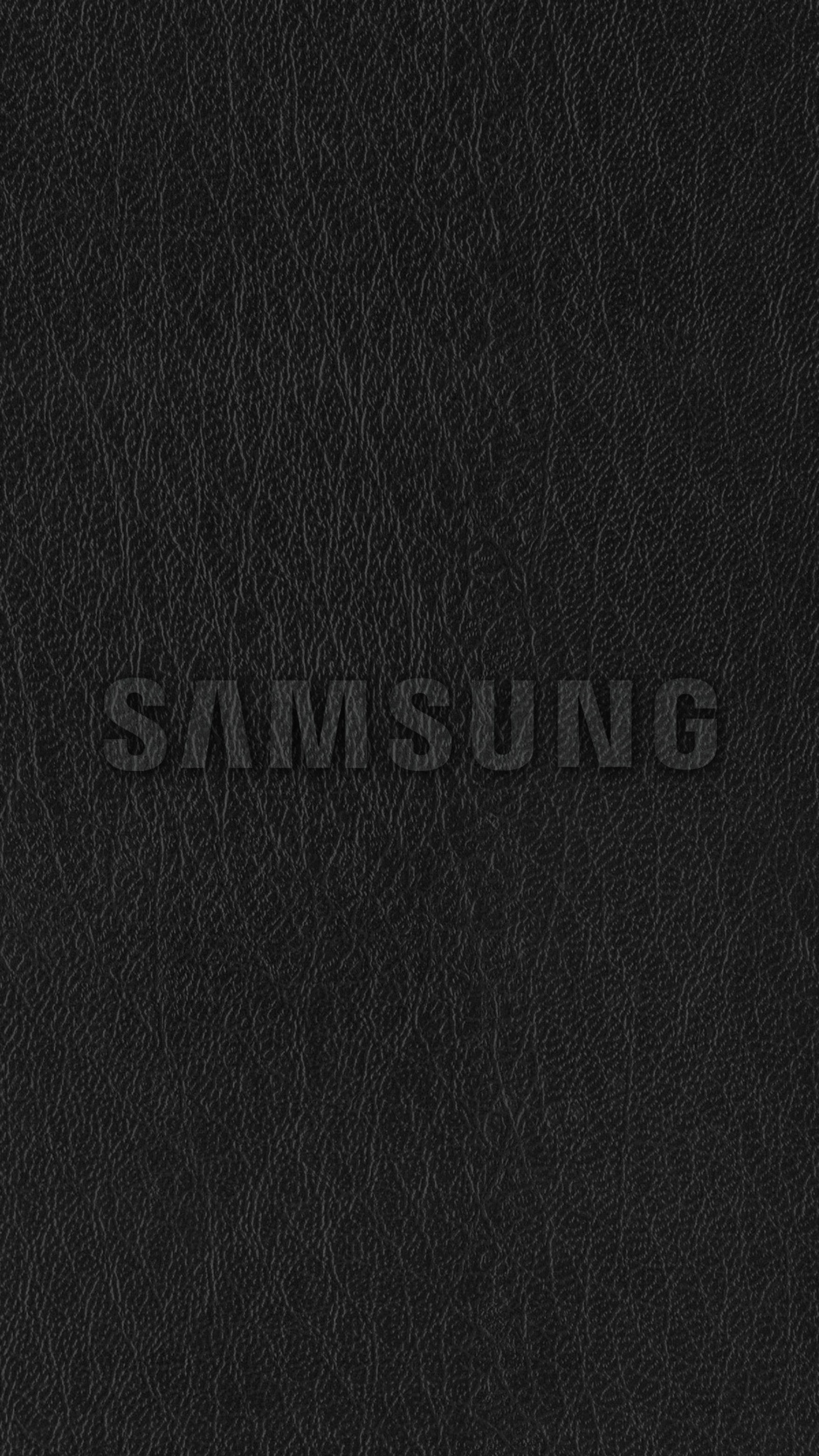 A close up of a black samsung phone with the samsung logo (2017, black, edge, galaxy, leather)