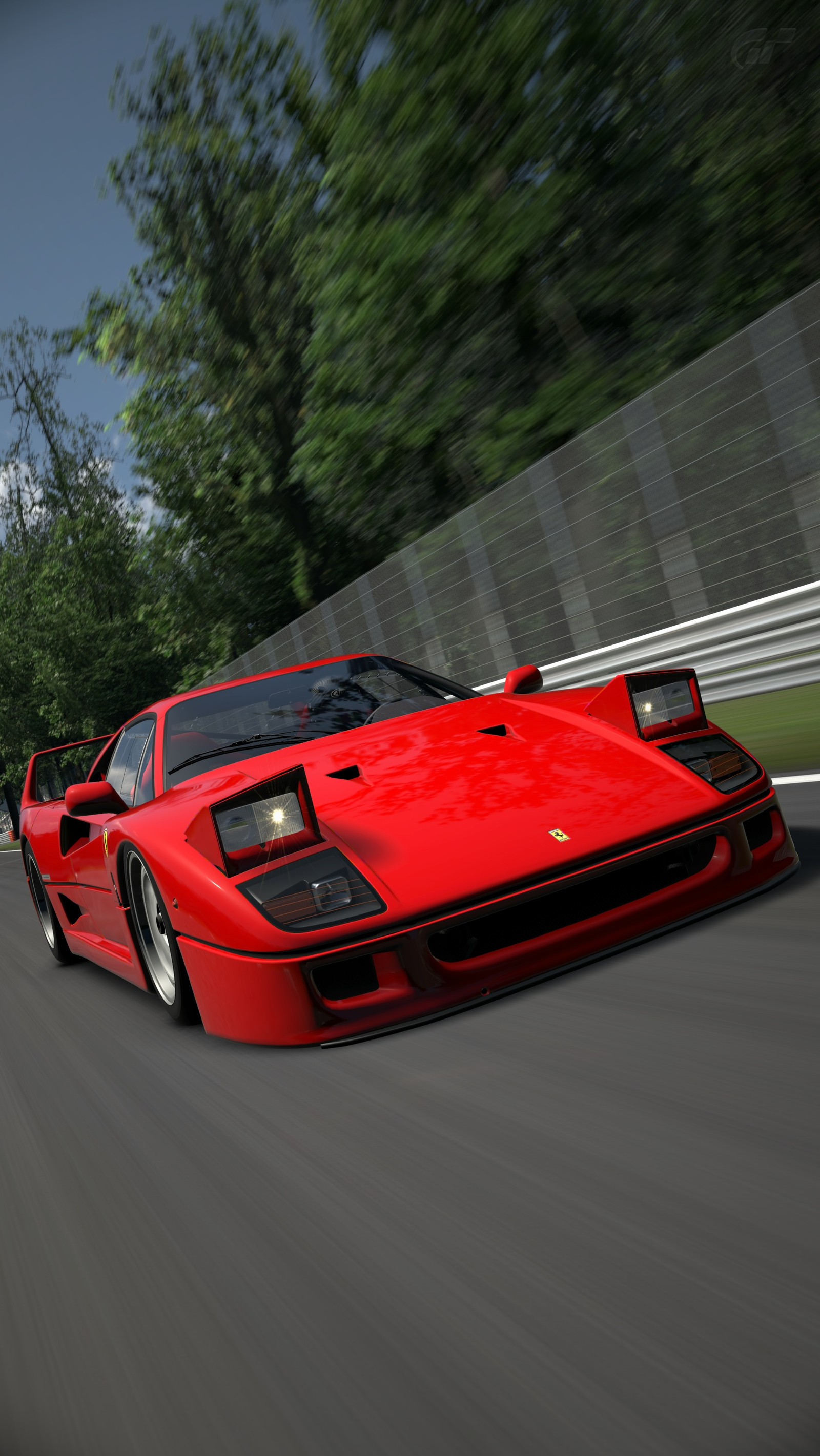 Um carro esportivo vermelho dirigindo em uma pista de corrida com árvores ao fundo (carro, carros, f40, jogo, corridas)