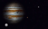 Jupiter and Its Moons: A Stunning View of the Gas Giant in the Cosmos