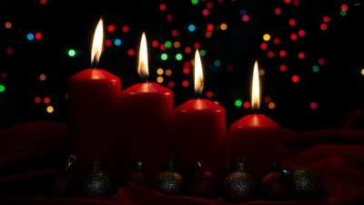 Illuminated Advent Candles Amidst a Festive Backdrop