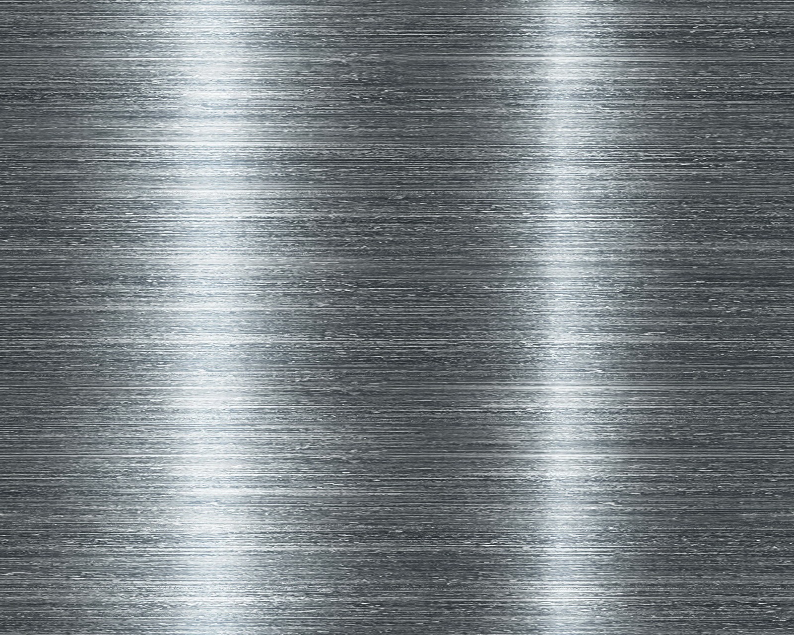 A close up of a metal plate with some light reflecting off of it (metal, plate, steel, texture)