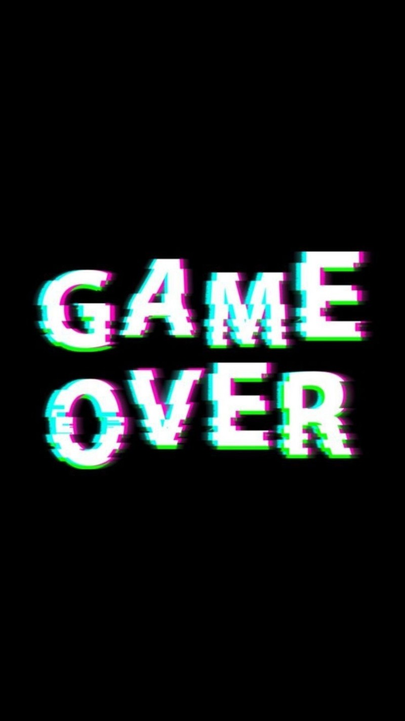 Крупный план черного фона с неоновым текстом 'game over' (игра окончена, игра)