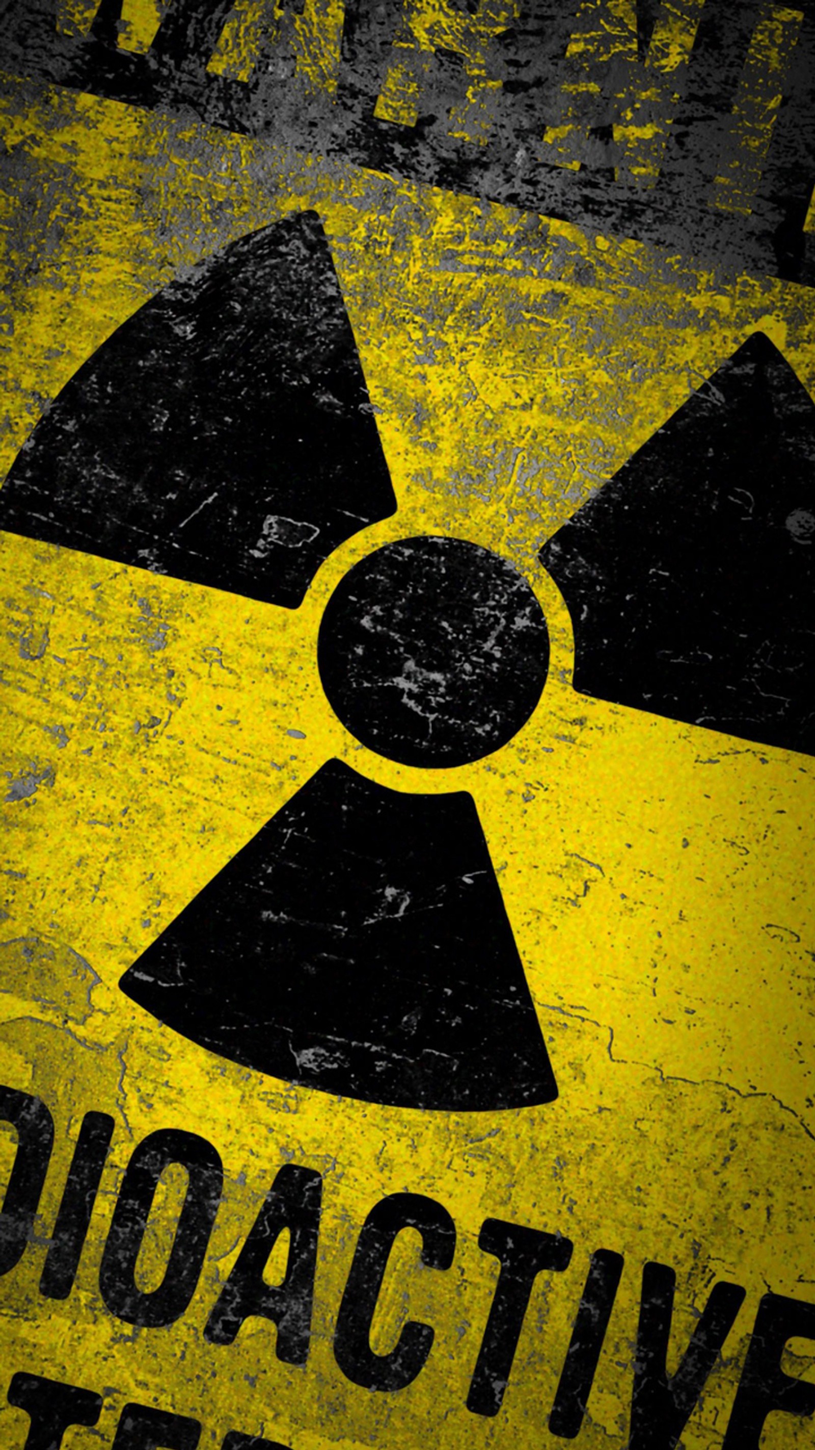 Radioactive sign on a yellow and black background with a black and white image (biohazard, radioactive)