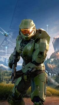 Master Chief 117 in Halo: A heroic stance amidst an expansive landscape.