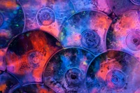 Vibrant Fractal Cosmos: Colorful Compact Discs in Psychedelic Harmony