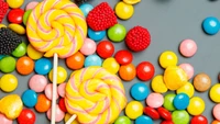 Colorful Assortment of Lollipops and Candy on a Table