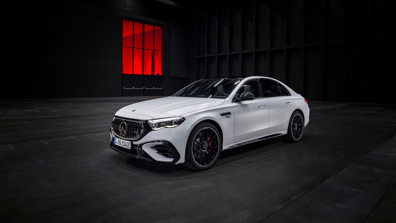 The mercedes amg gts coupe is shown in a dark room (mercedes amg e 53 hybrid 4matic, 2024, 5k, dark background, white cars)