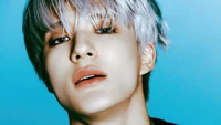 Jeno from NCT Dream: Striking Portrait with Silver Hair and Captivating Gaze