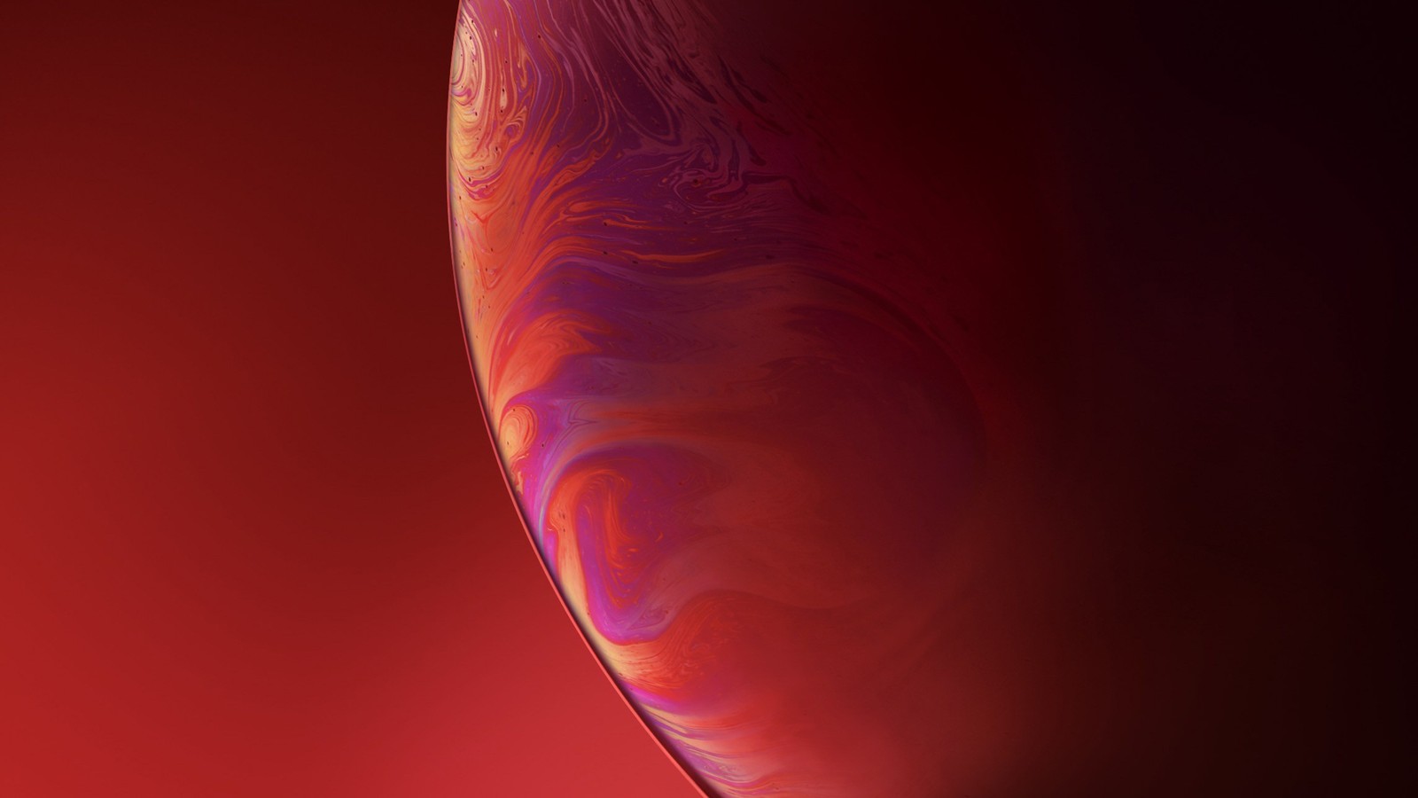 Gros plan d'un iphone xr rouge sur un fond rouge (ios, rouge, lumière, orange, atmosphère)