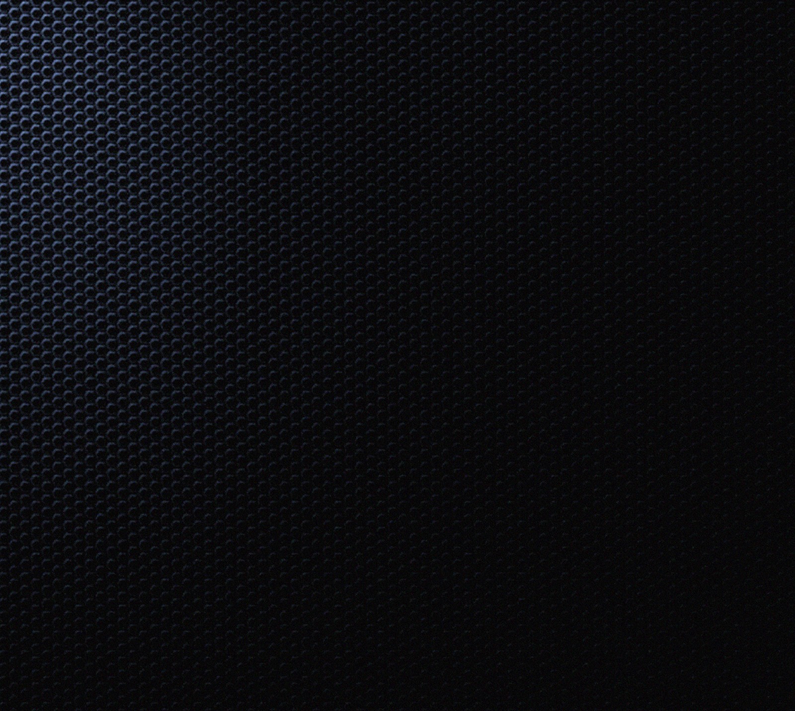 A close up of a black metal surface with a black background (awesome, black)