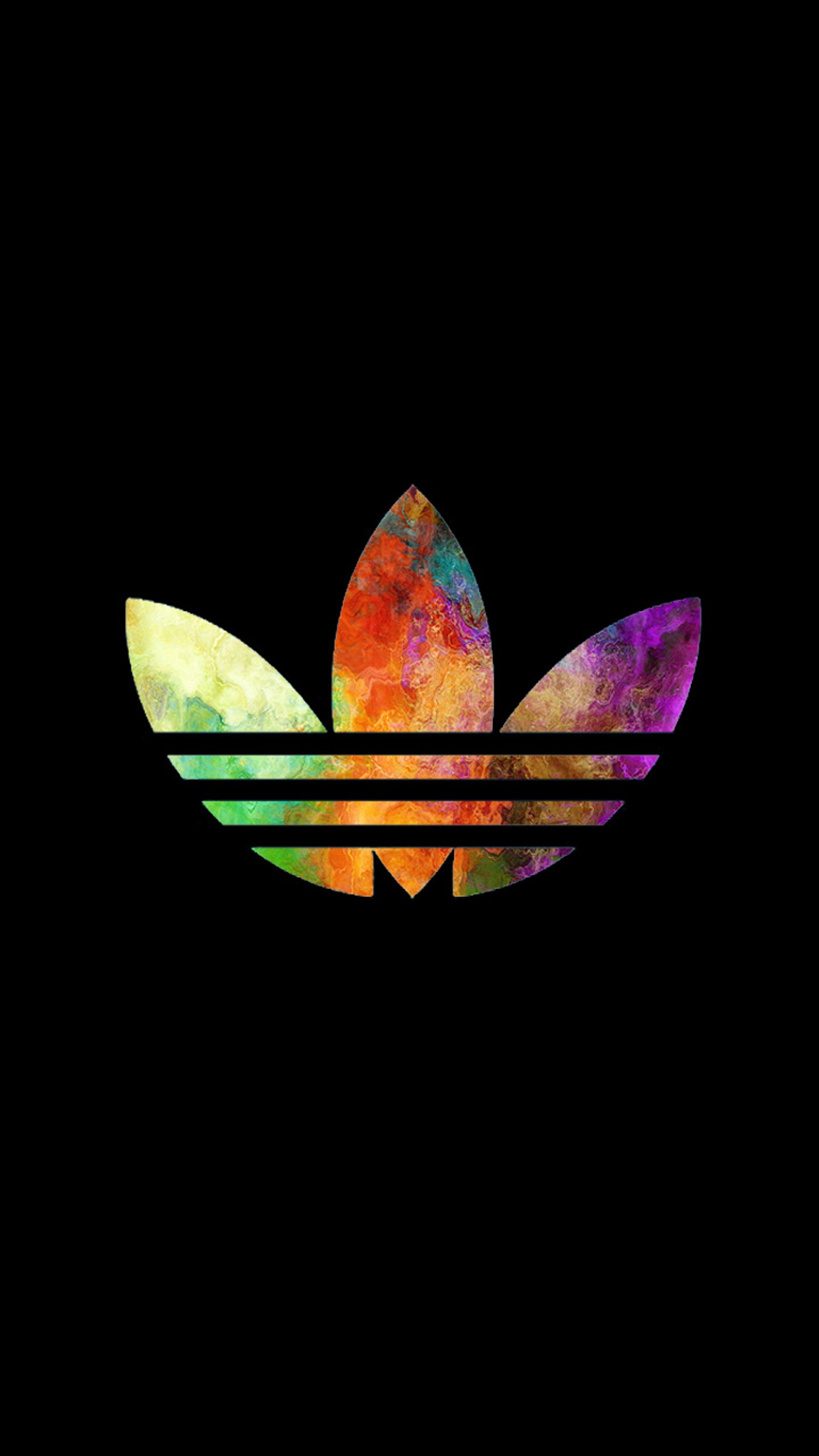 Gros plan d'un logo adidas coloré sur fond noir (cool 2, vahagn555)