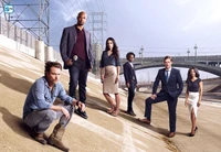 Stylish Cast Posing on Urban Landscape