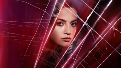 Isabela Merced as Madame Web in a striking, web-themed portrait.