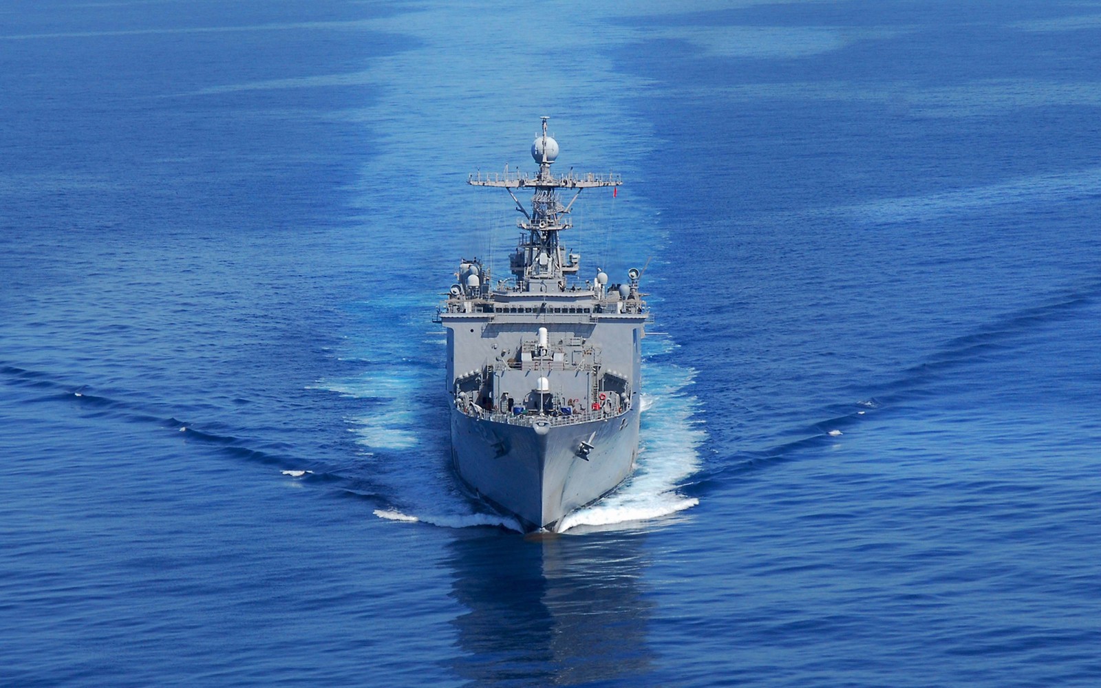 A close up of a navy ship in the water with a lot of water (warship, destroyer, aircraft carrier, navy, ship)