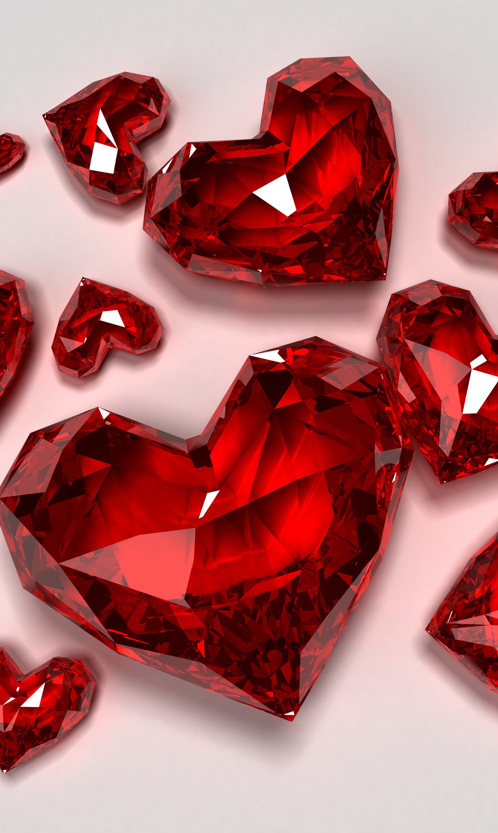 A close up of a bunch of red diamonds on a white surface (heart, red, red hearts)