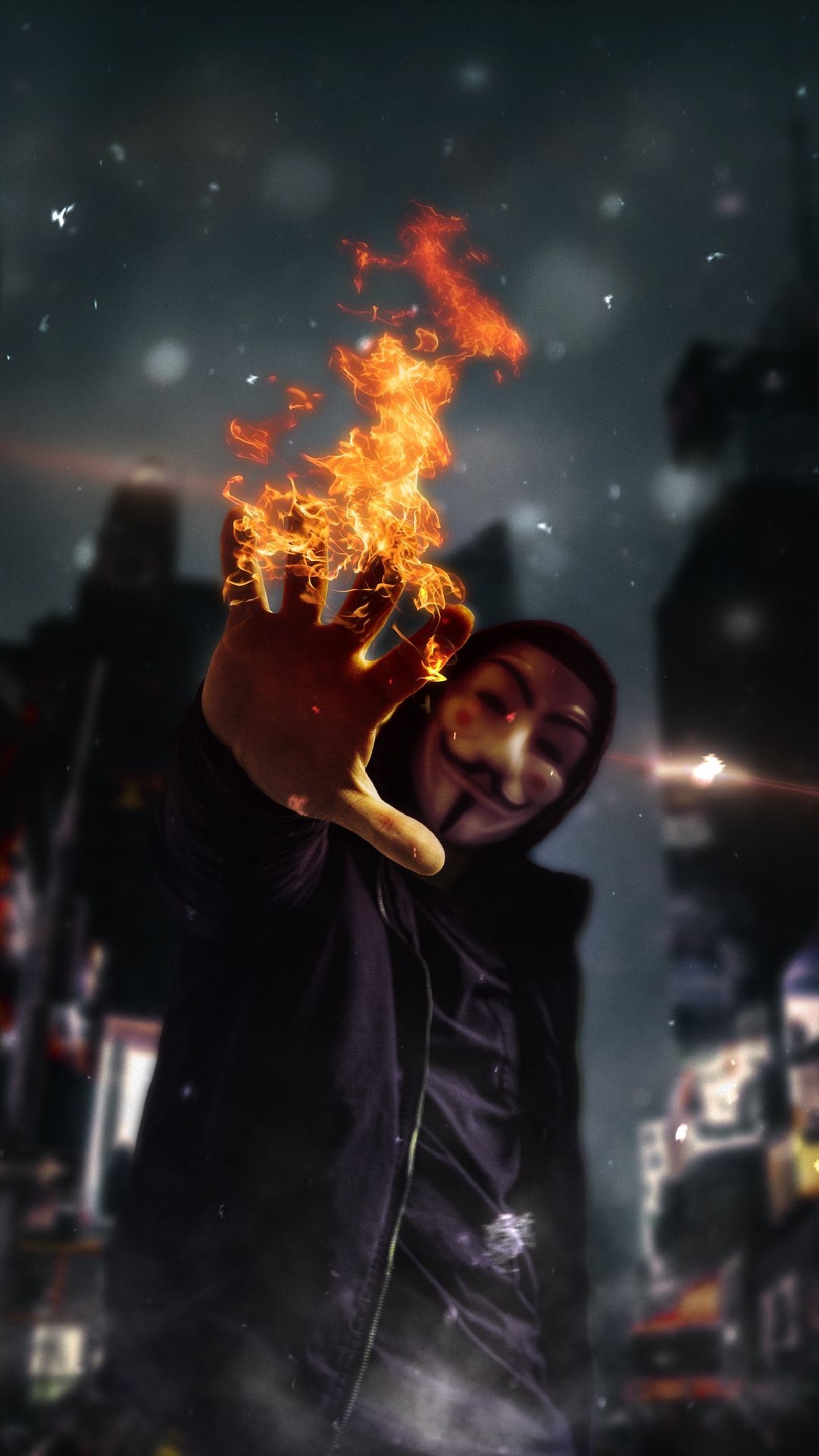 There is a man holding a burning banana in his hand (anonymous, burn, burning, fire, hand)