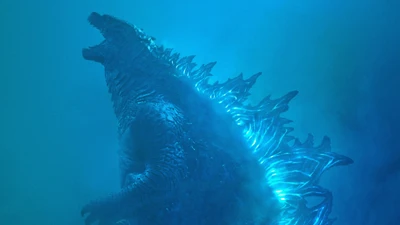 Godzilla: El Rey Emergiendo en una Espectacular Aura Azul