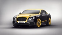 Black and yellow Bentley Continental GT with distinctive wheels and a sleek design, showcasing luxury automotive craftsmanship.