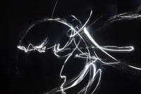 Dynamic Light Trails in Darkness: A Fractal Art Exploration