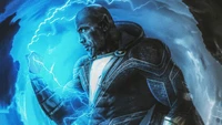 Dwayne Johnson en tant que Black Adam entouré d'énergie électrisante.