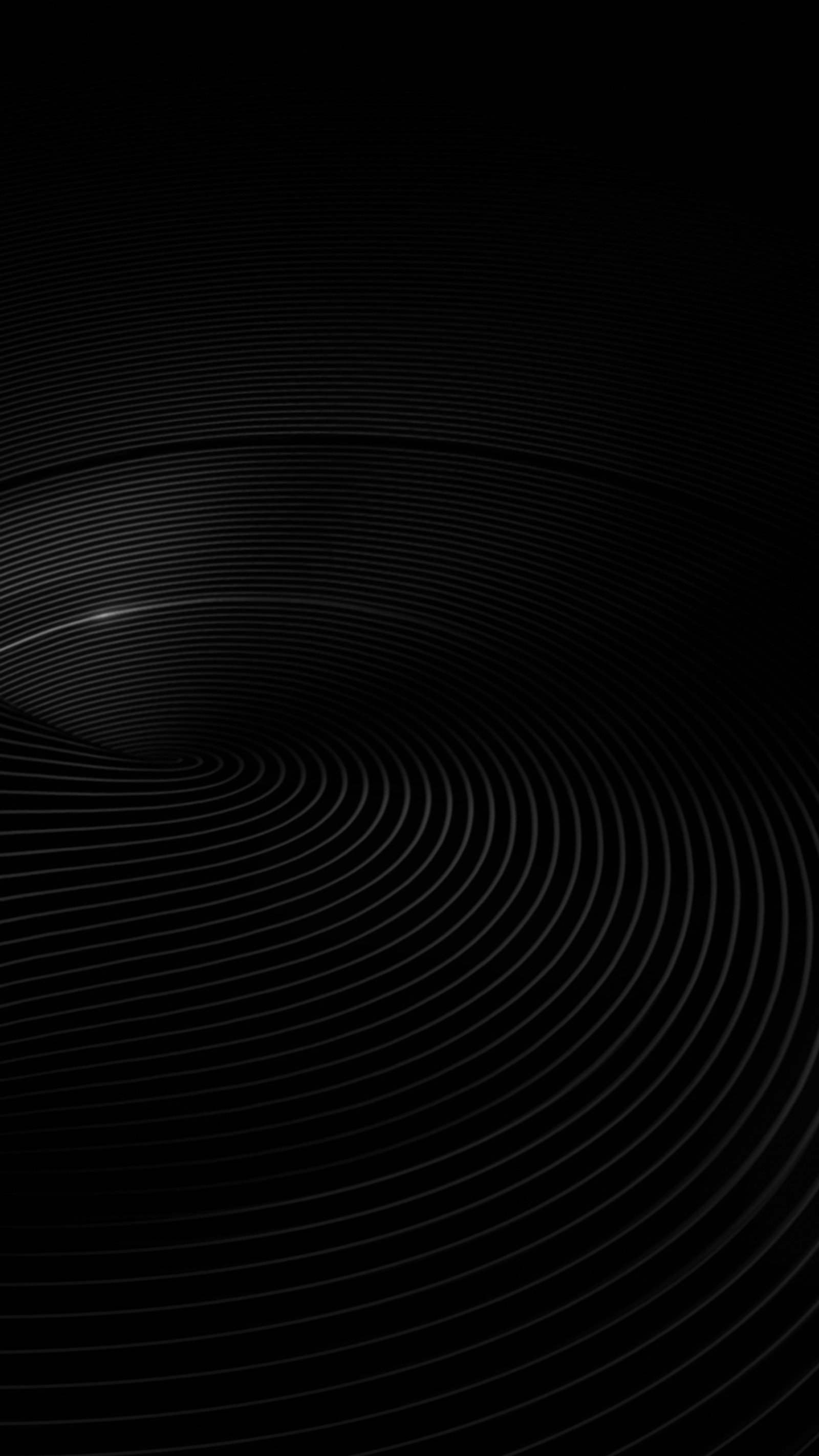 A black and white photo of a spiral design with a black background (abstract, background, black)