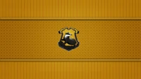 Hufflepuff Crest on Yellow Patterned Background