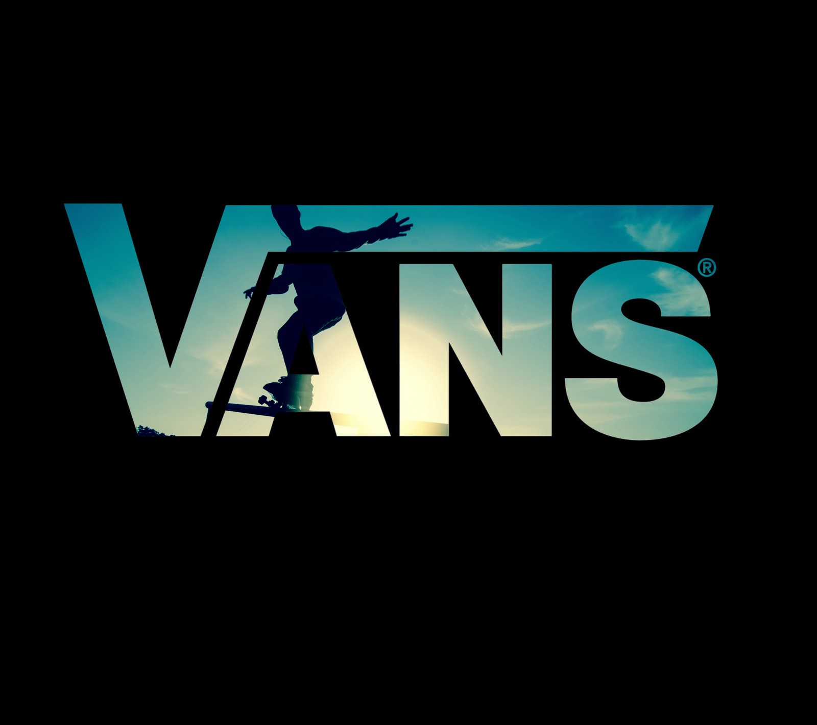 Skateboarder en silueta sobre un fondo oscuro con la palabra "vans" (marca, logotipo, patineta, vans, vans off the wall)