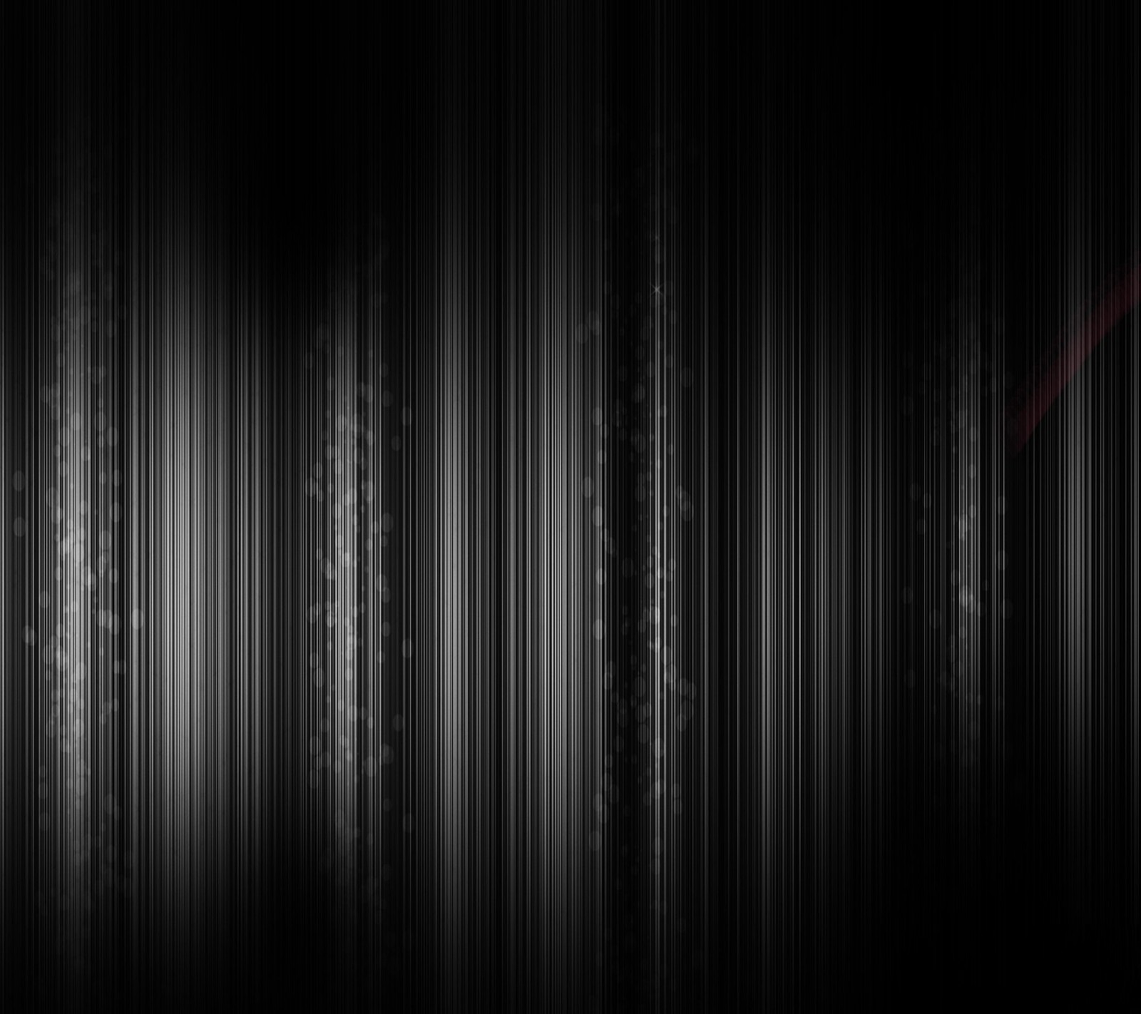 A close up of a black and white striped wallpaper with a red light (metalic, wallpaper)