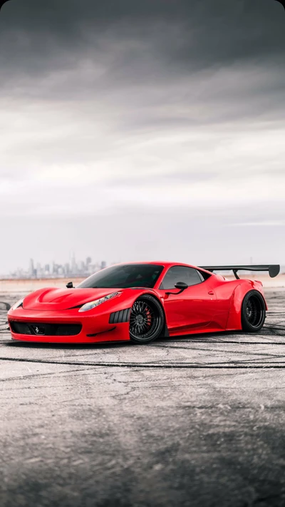 Roter Ferrari 458 Supersportwagen vor urbanem Asphalt-Hintergrund