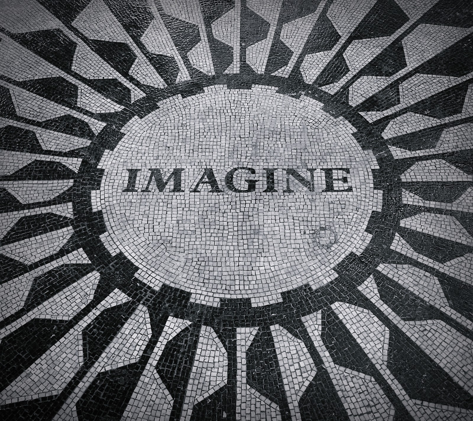 A close up of a mosaic with the word imagine in it (beatles, city, lennon, new york, nyc)