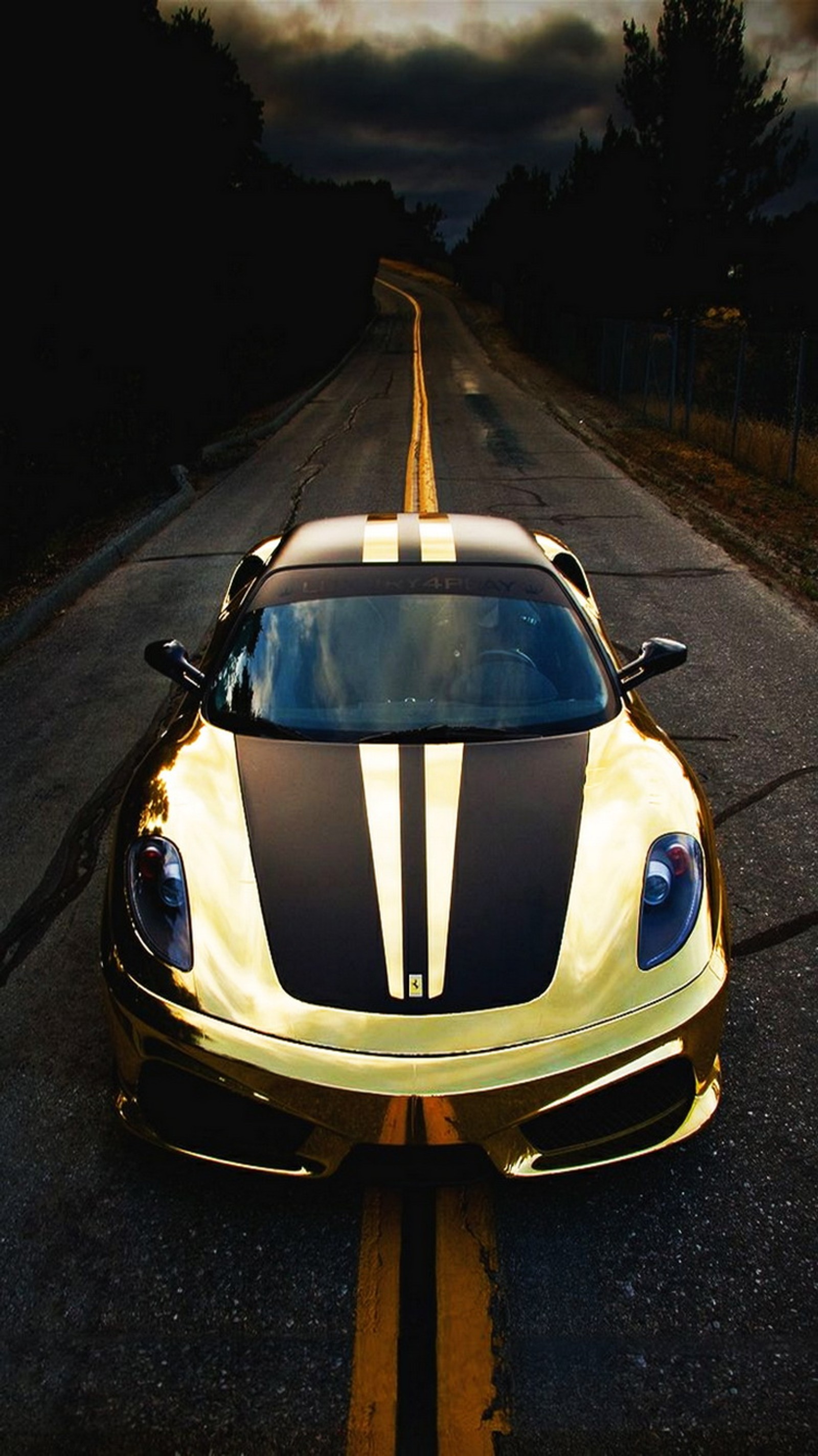 Arafed yellow sports car parked on the side of the road (ferrari, ferrari 430, gold, scuderia)