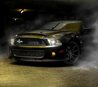 Sleek Black Sports Car in Dramatic Lighting and Smoke